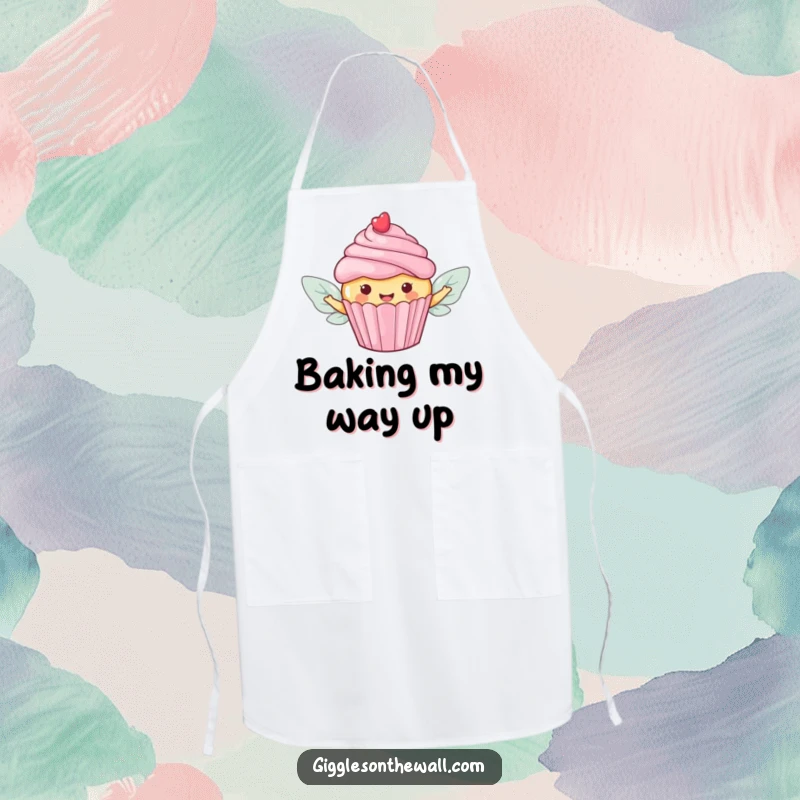 Funny apron depicting a happy cupcake with candy wings, ready to fly off to a delicious destination.