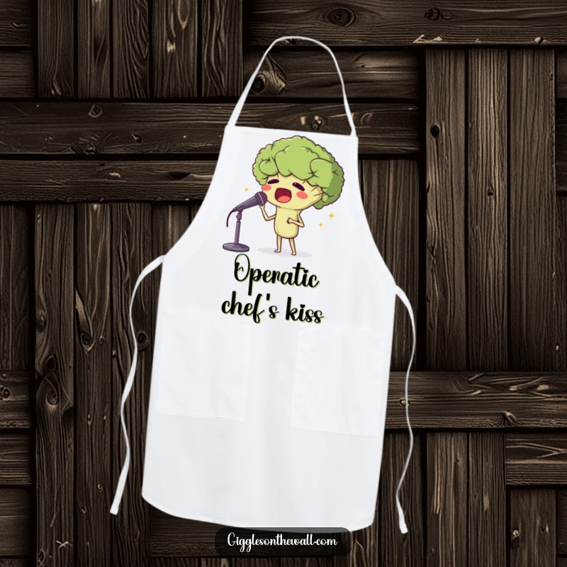 Funny apron showcasing a proud broccoli head singing opera into a microphone, adding humor and theatricality to cooking.
