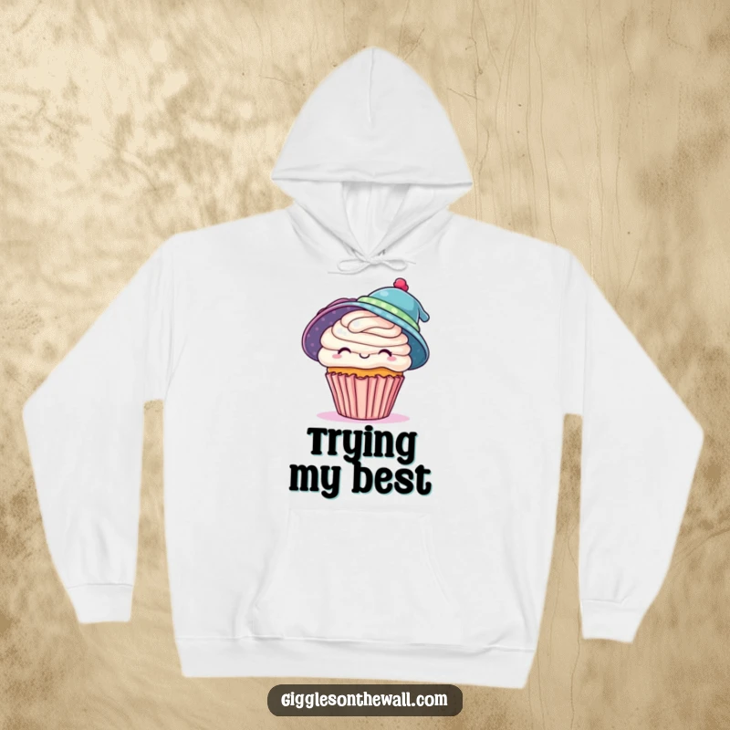 Funny hoodie with a cupcake humorously sporting two hats, providing warmth and a playful vibe, a wonderful funny gift.