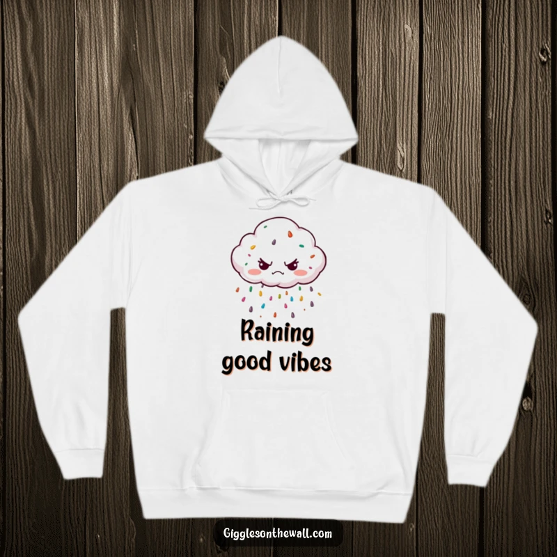 Funny grumpy cloud character raining colorful sprinkles on a cozy hoodie, offering warmth and a dose of playful, unexpected cheer.