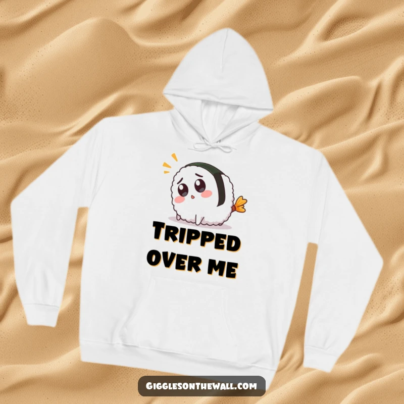 Funny hoodie showcasing a surprised sushi character hilariously tripping over its tail, perfect for cozy, comical moments.