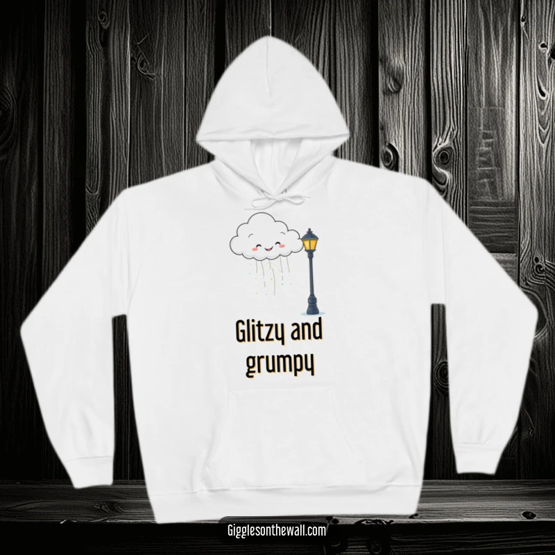 Funny hoodie showcasing a happy cloud raining glitter onto a grumpy lamppost, offering comfort and whimsical charm.