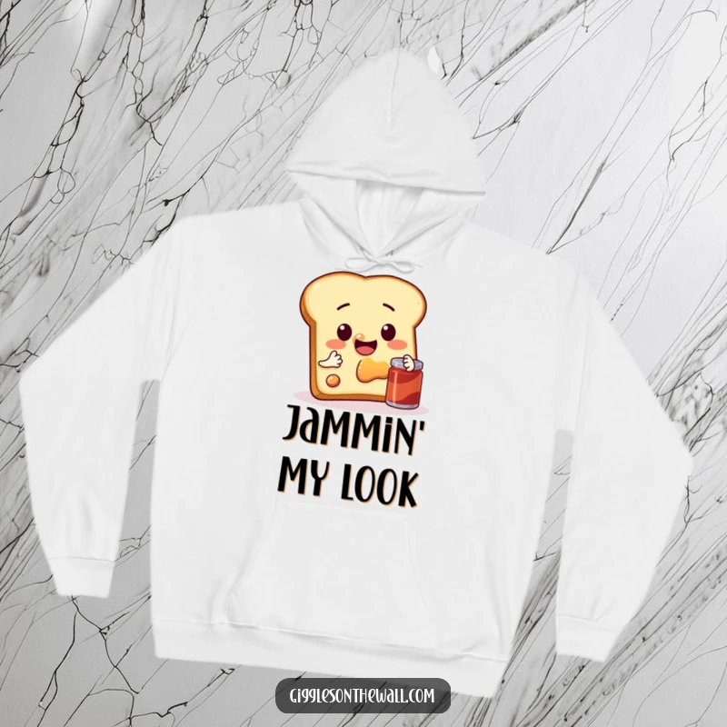 Funny hoodie showcasing a sentient slice of toast taking a selfie with jam, offering comfort and comedic charm.