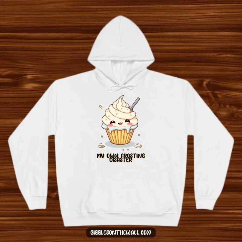 Funny hoodie displaying a cupcake character comically attempting to frost itself, creating a wonderfully messy look.