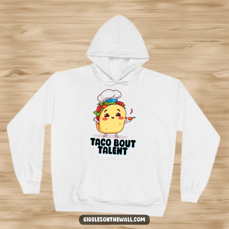 Funny taco wearing a chef hat, comically juggling chili peppers, cozy and humorous hoodie design for food lovers.