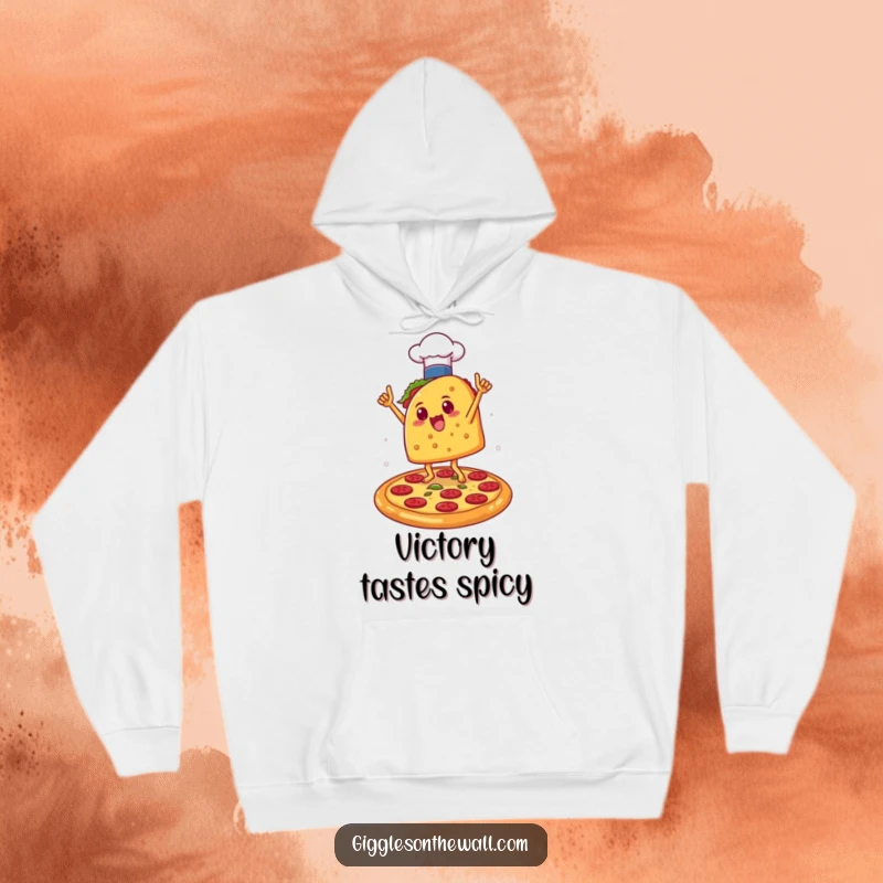 Funny Taco Chef Hoodie: A warm hoodie depicting a taco in a chef hat dancing victoriously on a pizza, offering humorous culinary celebration.