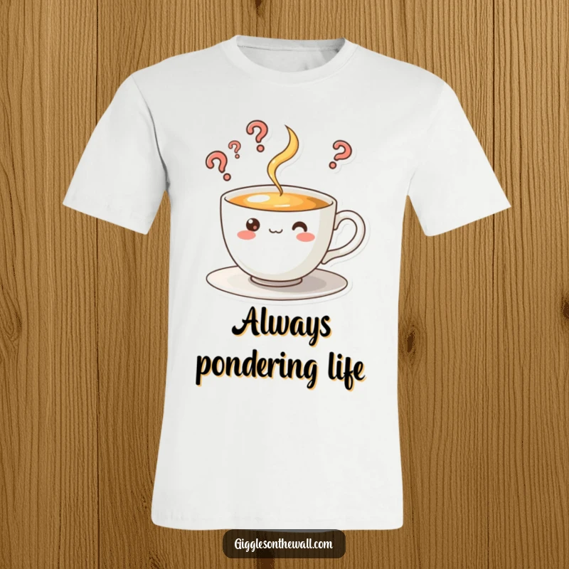 Funny t-shirt featuring a curious teacup character with steam rising in question marks, embodying playful inquiry.