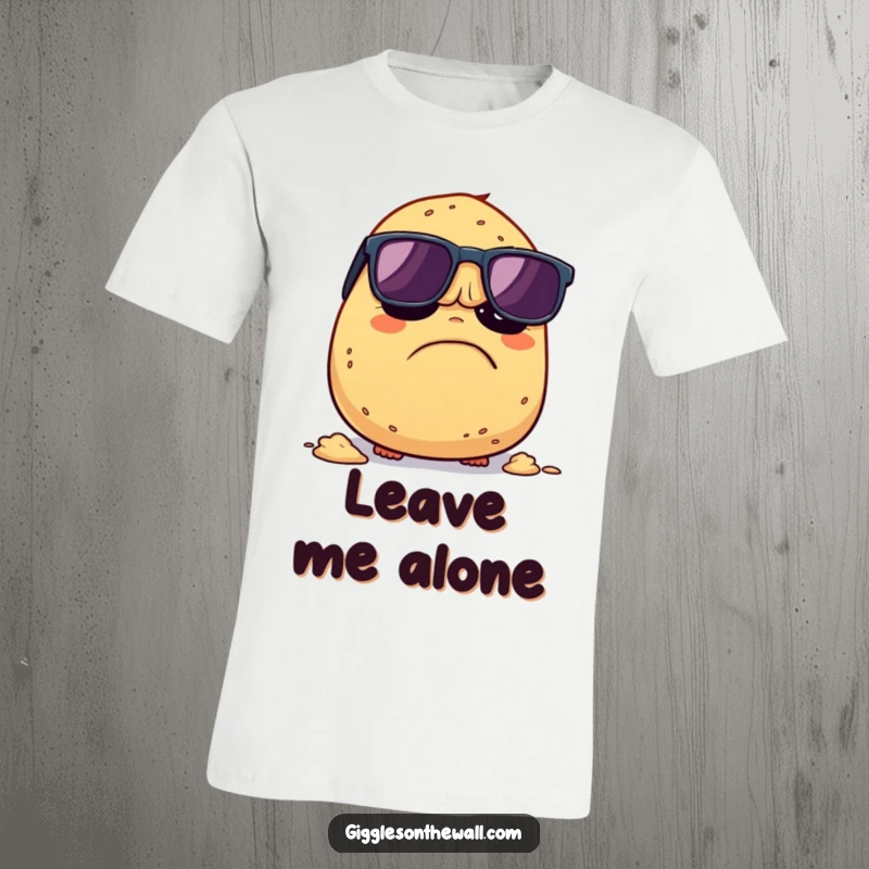 Funny Grumpy Potato T-Shirt: A grumpy potato in sunglasses humorously attempts to escape its destiny of being mashed, showcasing witty veggie humor.