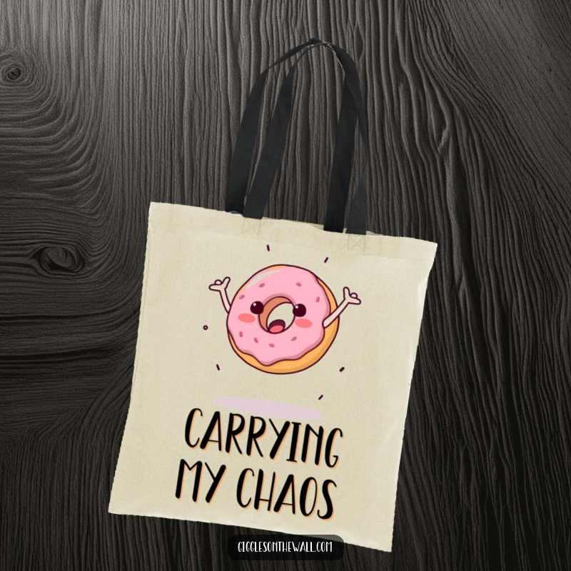 Funny tote bag showcasing a donut with arms doing a clumsy cartwheel, perfect for carrying items with a humorous touch.