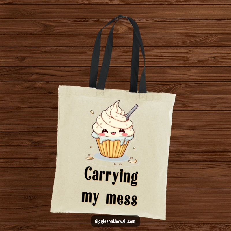 Funny tote bag featuring a cupcake character hilariously trying to frost itself, making a sweet mess, great for shopping.