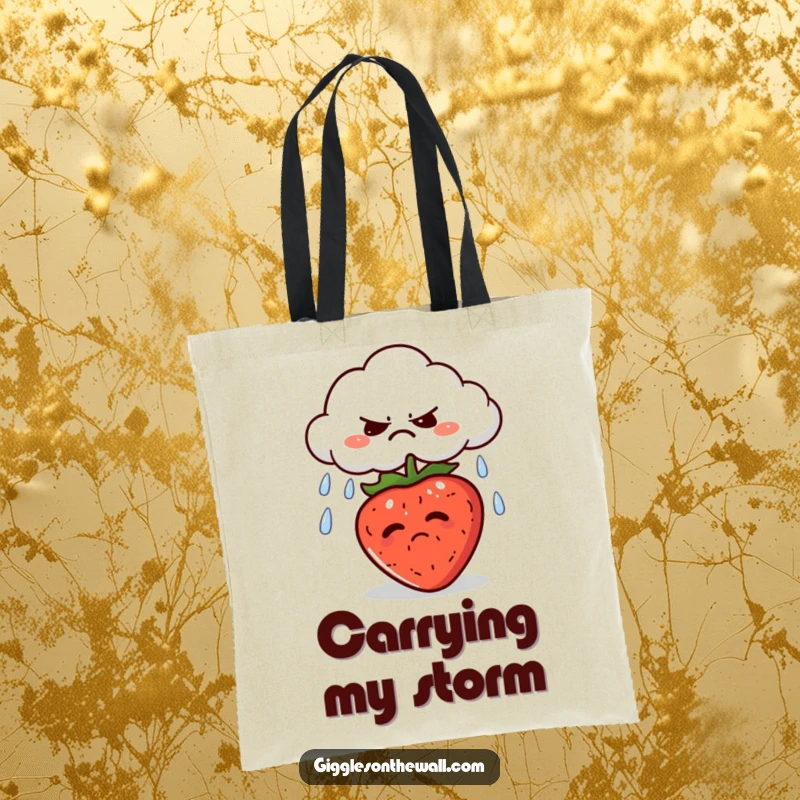 Funny tote bag showcasing a grumpy cloud spitting rain onto a sunbathing strawberry, perfect for carrying items with weather humor.