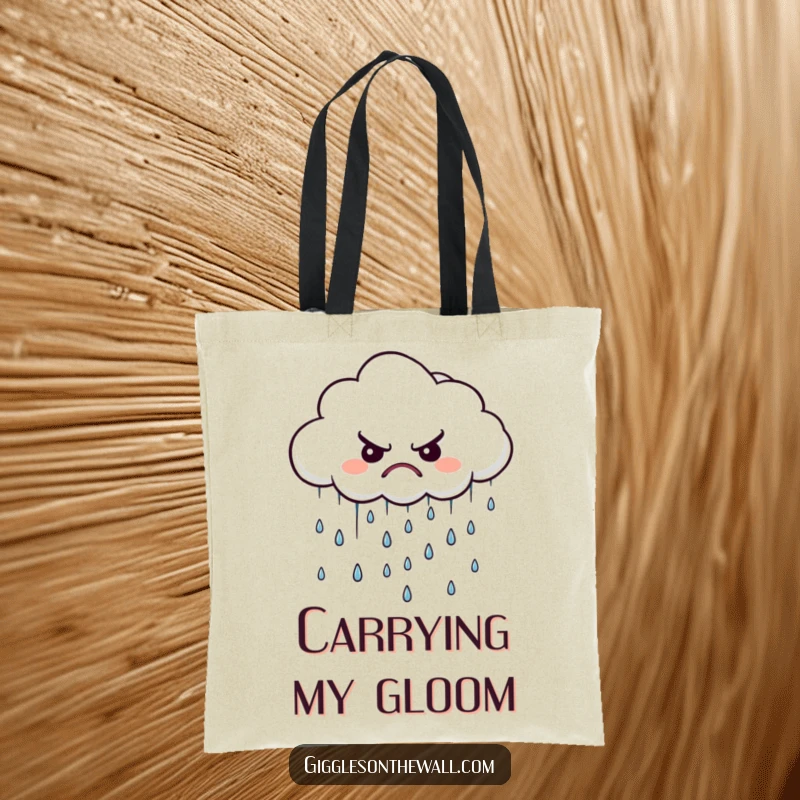Funny grumpy cloud tote bag, depicting a displeased cloud raining tiny, disgruntled raindrops, ideal for everyday use.