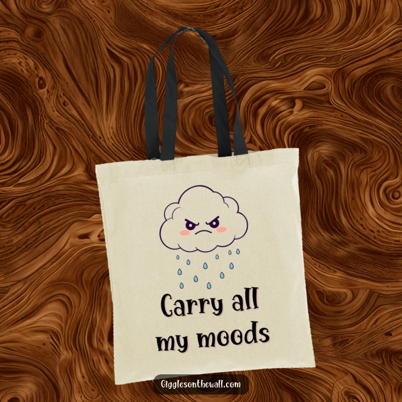 Funny tote bag depicting a grumpy cloud character showering tiny, happy raindrops, perfect for carrying daily items.